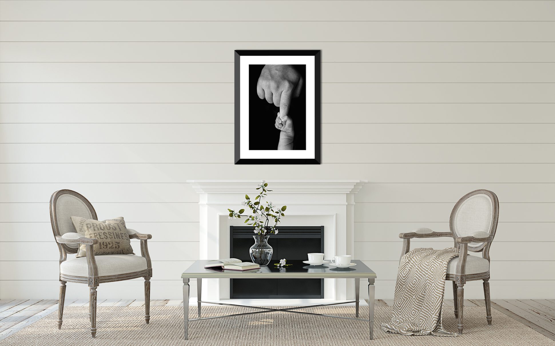 Huntsville newborn photography displayed above a fireplace