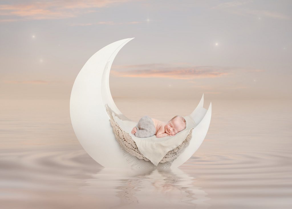 Newborn photography in Huntsville AL by Ellen Adams Photography newborn photo of baby on a moon