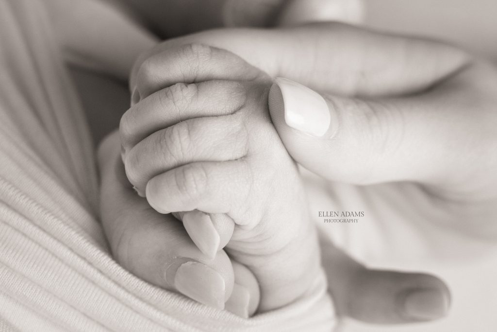 Newborn photographer in Huntsville, AL gives tips on how to relax your baby during your newborn pictures.