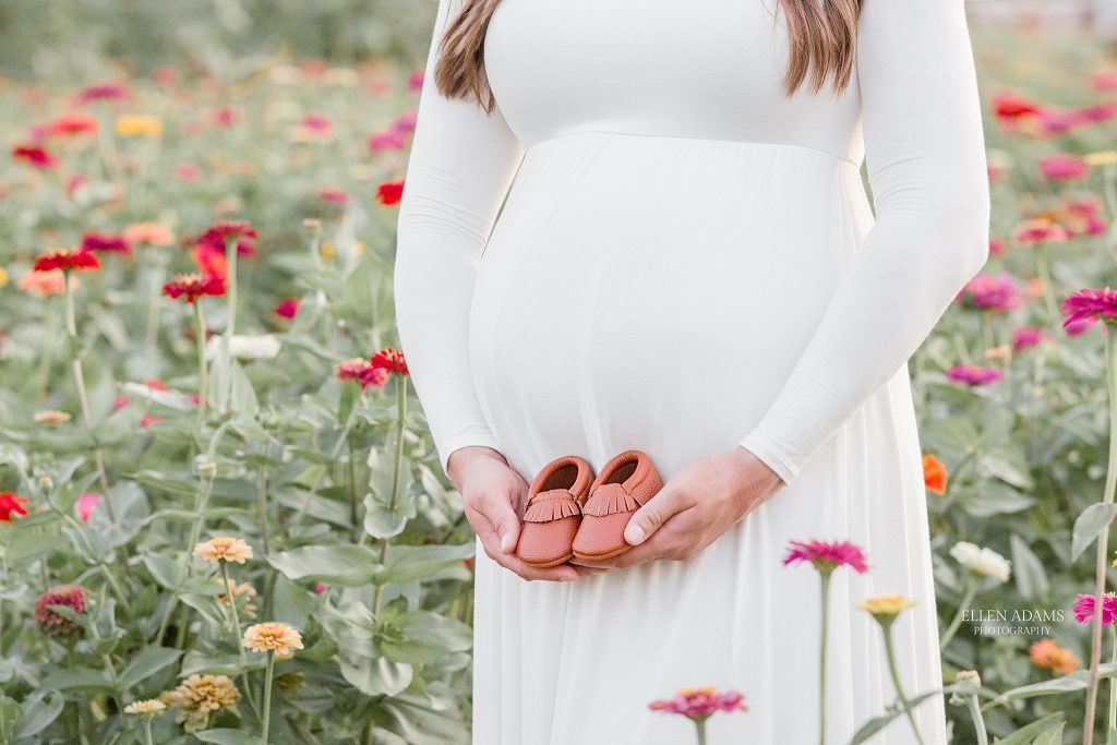 Gender neutral maternity pictures in a flower field by Ellen Adams Photography in Huntsville, AL.