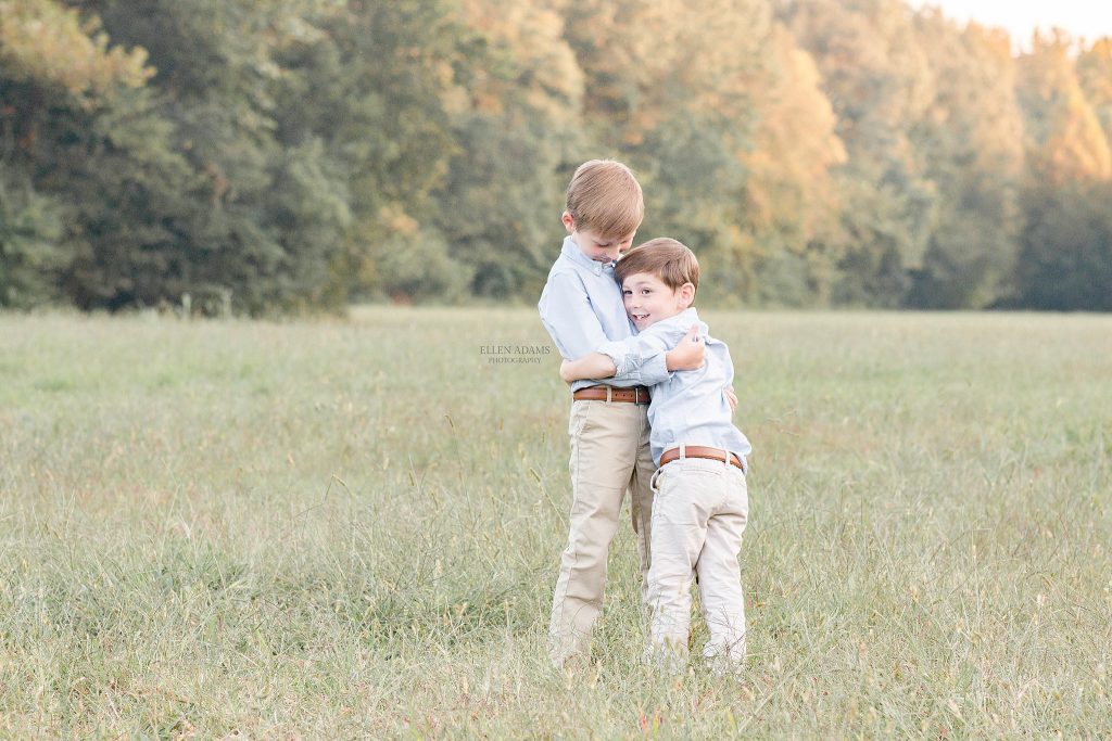 Huntsville family photographer Ellen Adams Photography of Huntsville AL created this portrait of two brothers hugging.