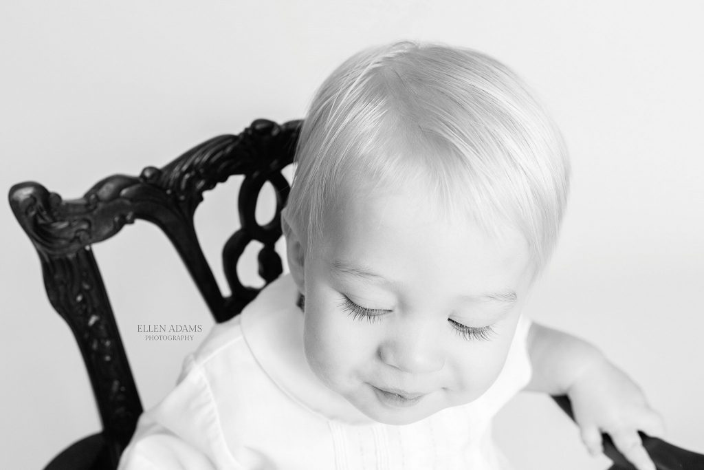 1 year portraits by Ellen Adams Photography in Huntsville AL picture of a baby's eyelashes in black and white.