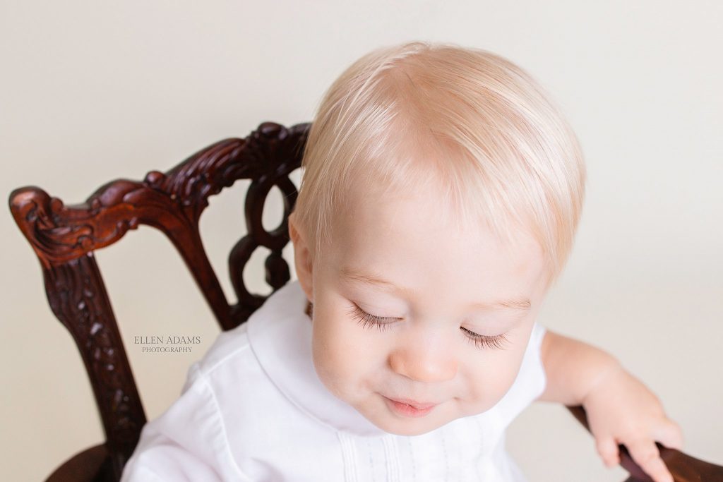 One year old picture by Ellen Adams Photography in Huntsville, AL featuring baby eyelashes.