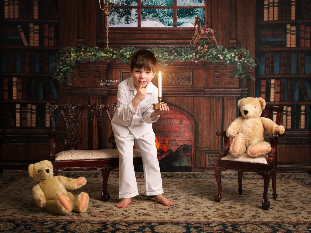 Christmas picture in Huntsville AL  idea with a little boy with a candle, captured by Ellen Adams Photography.