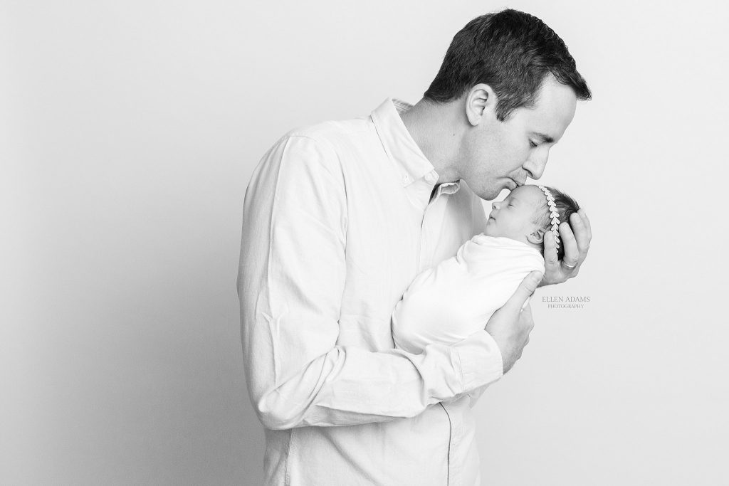 Dad kissing baby picture by Ellen Adams Photography in Huntsville, AL.