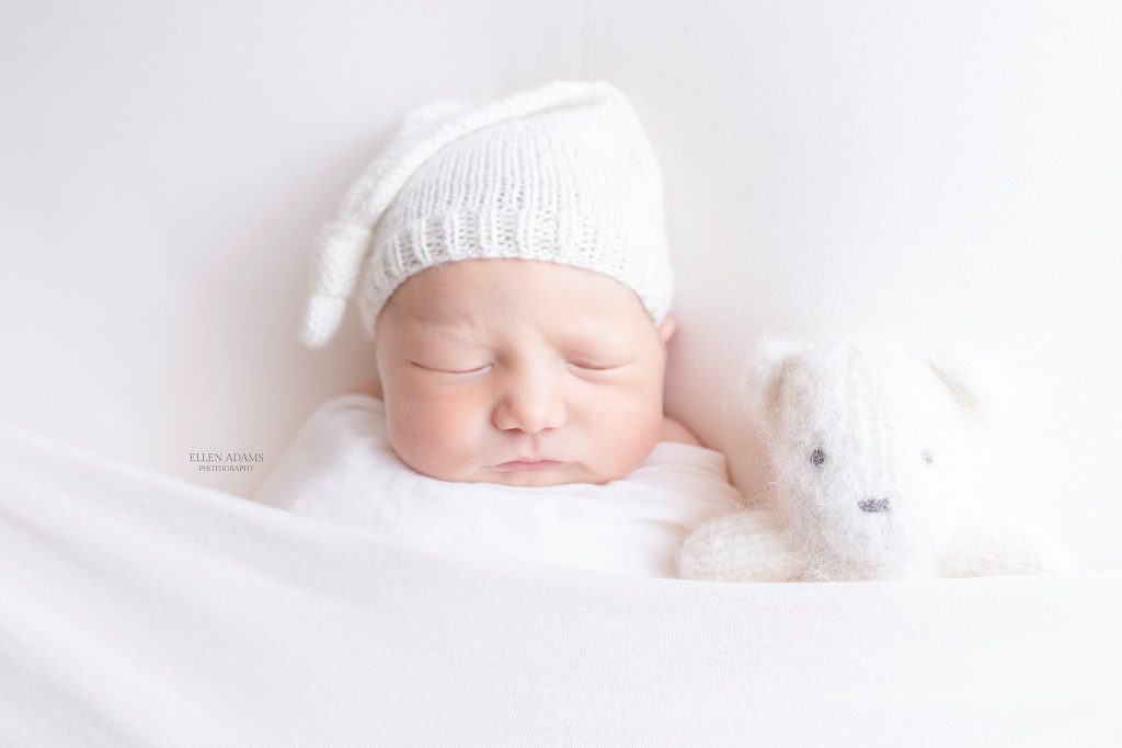 Newborn sleeping with teddy bear picture by Ellen Adams Photography in Huntsville, AL.