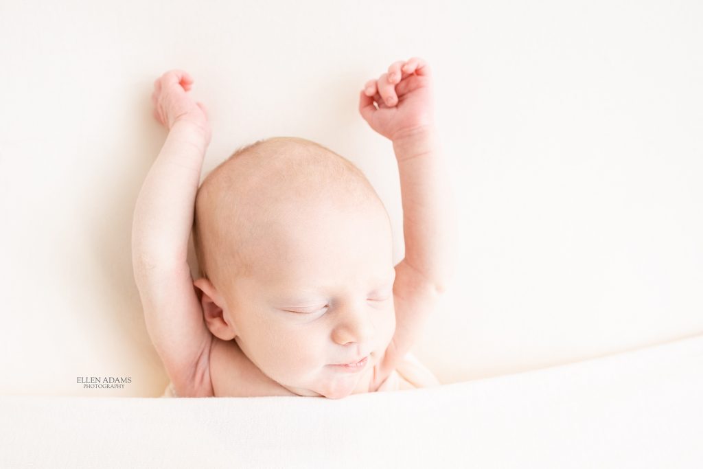 Stretching baby captured by Ellen Adams Photography.
