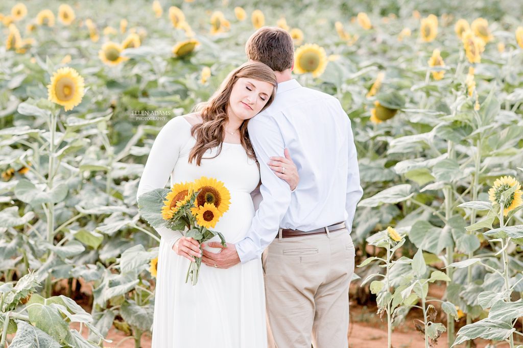 Ellen Adams Photography maternity pictures in a sunflower field.